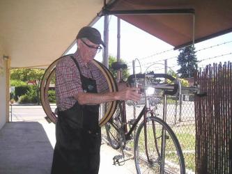 Longtime Federationist George Blackstock works on a bicycle in his shop in the Napa Valley.